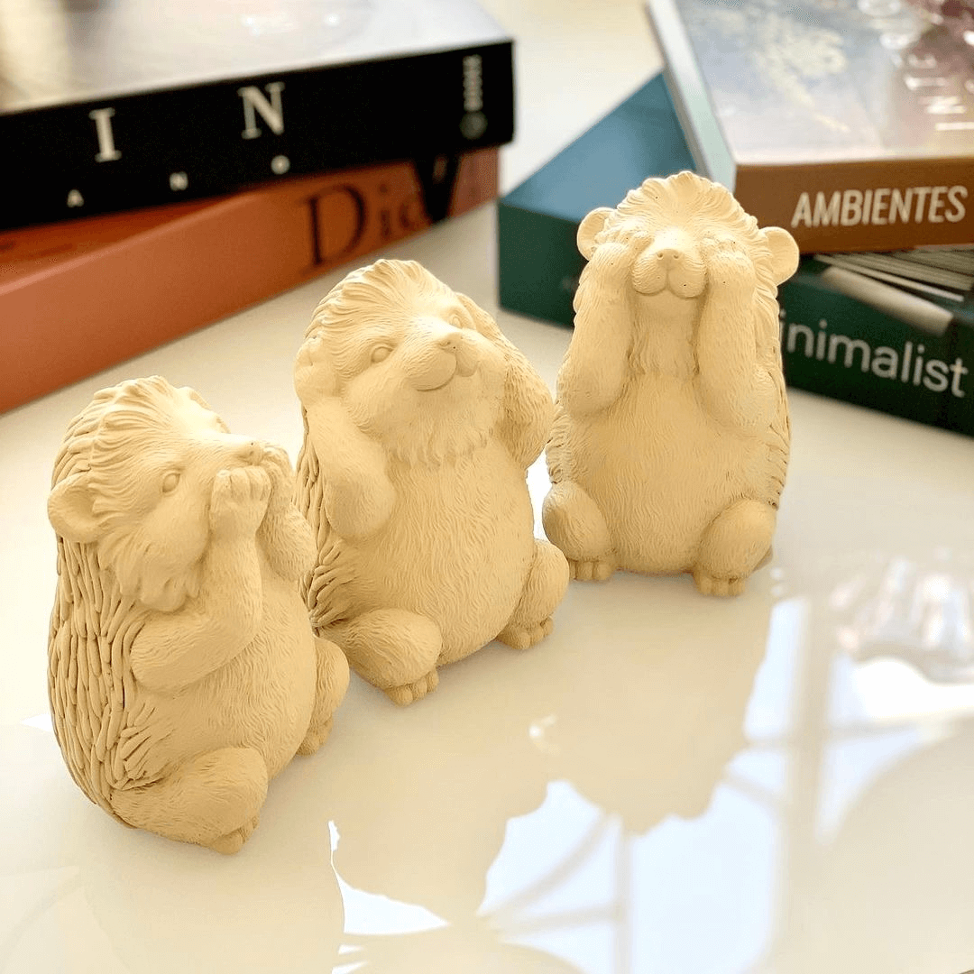 Trio of wisdom Kit Squirrels Porcupine in cement