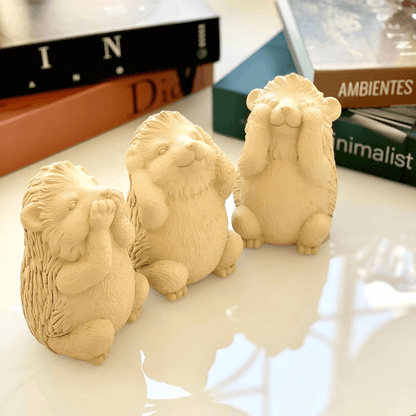 Trio of wisdom Kit Squirrels Porcupine in cement
