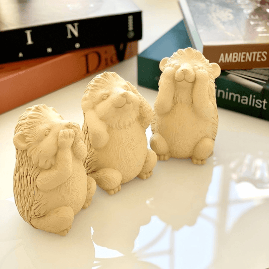 Trio of wisdom Kit Squirrels Porcupine in cement