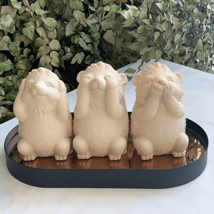 Trio of wisdom Kit Squirrels Porcupine in cement